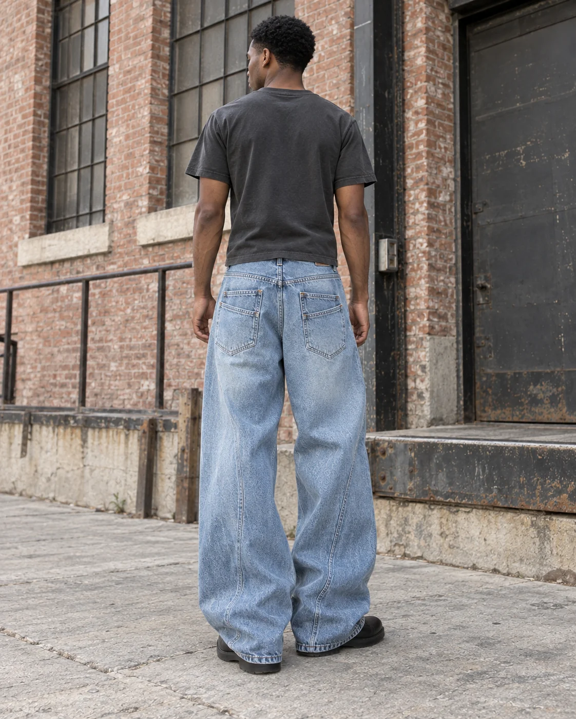 Distinct back design on the same model — Baggy Wide-Leg Jeans in ice blue / faded indigo, AI-generated design concept
