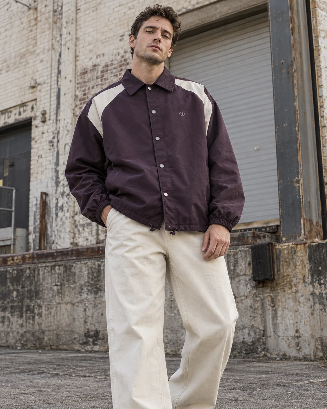 Front on-model view — Coach Jacket in washed aubergine / bone, AI-generated design concept