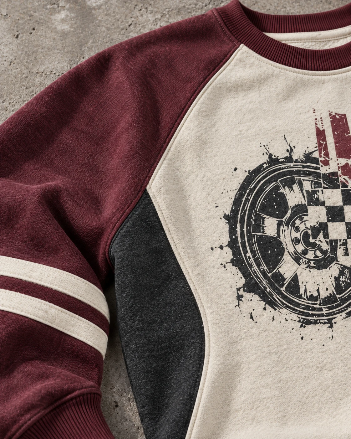 Close-up of fabric and signature construction — Contrast Raglan Sweatshirt in cream / oxblood / charcoal, AI-generated design concept