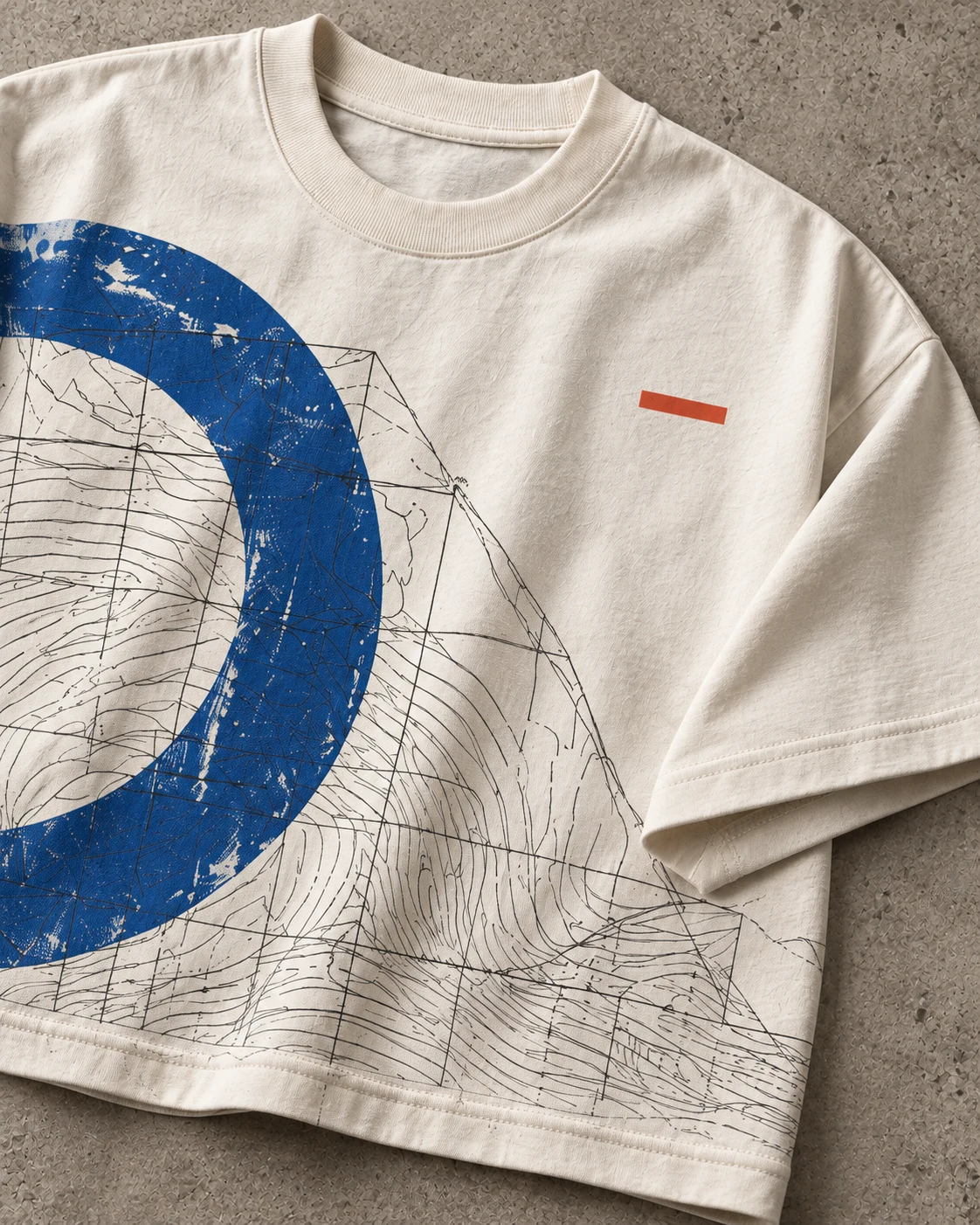 Close-up concept of cropped wide T-shirt rib collar, cotton jersey texture, cobalt graphic and fine black print lines