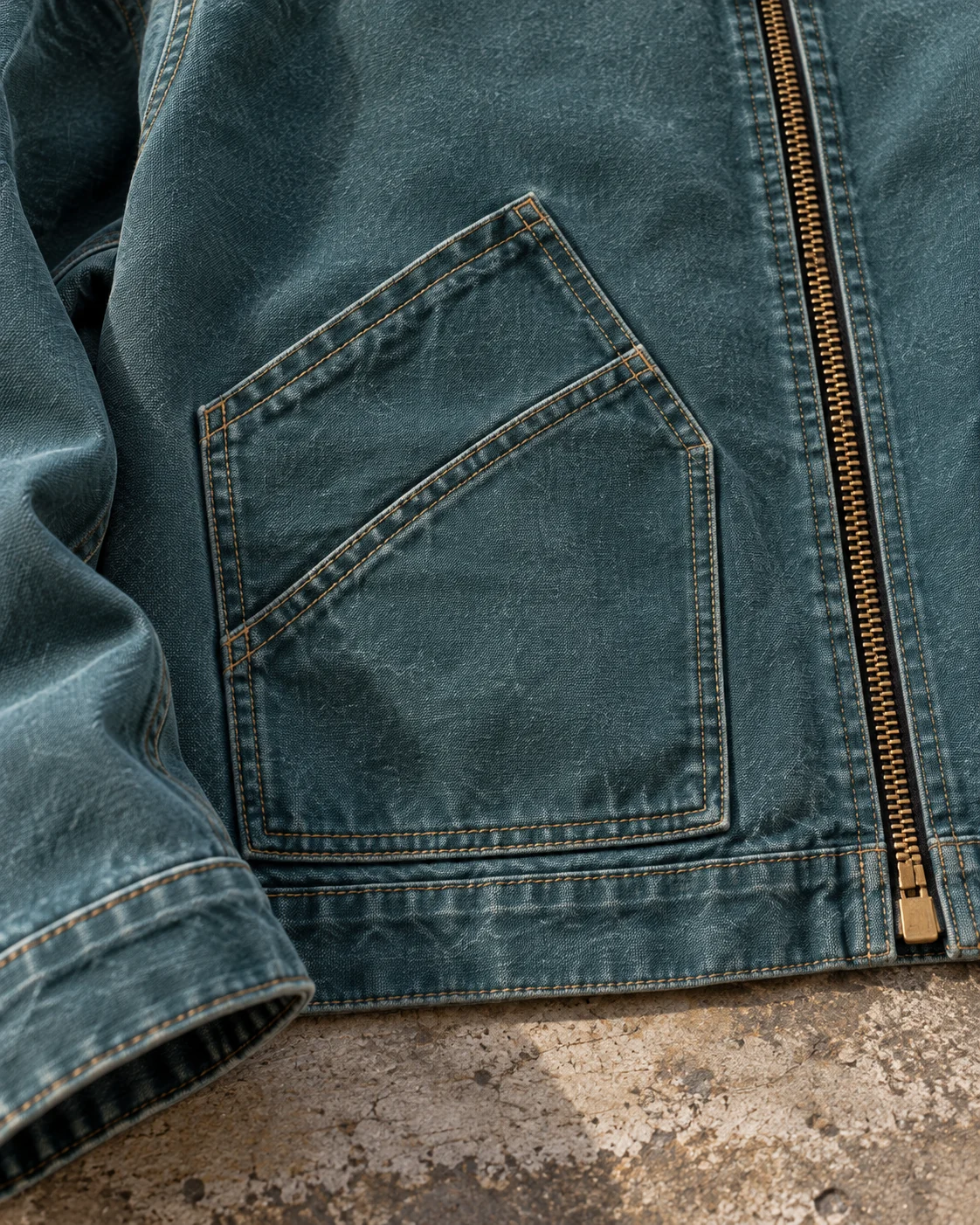 Close-up of fabric and signature construction — Cropped Work Jacket in faded petrol / dark brown, AI-generated design concept