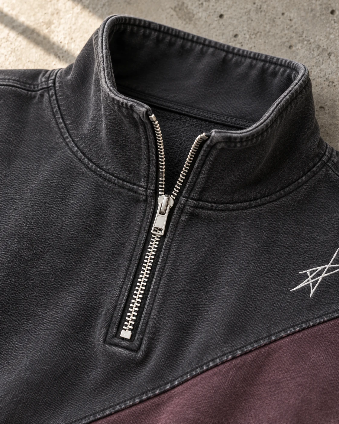 Close-up of fabric and signature construction — Half-Zip Sweatshirt in washed graphite / dusty plum, AI-generated design concept