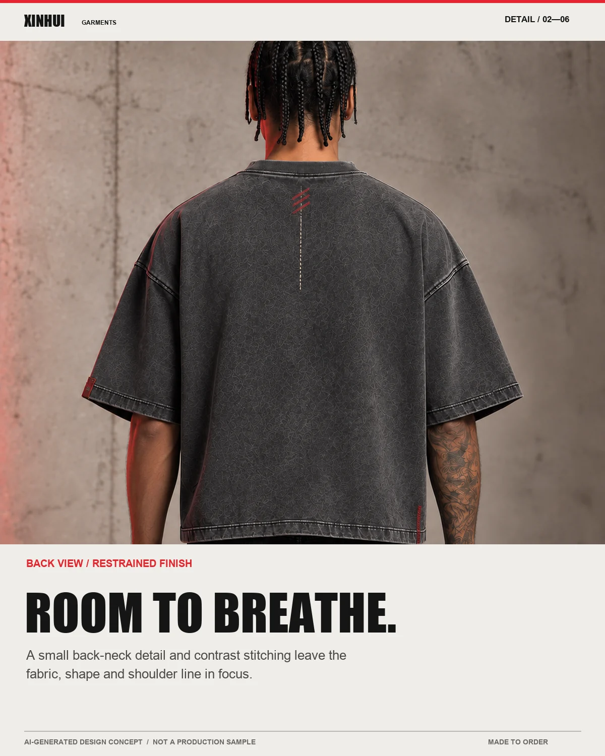 Back view of the same boxy T-shirt concept with a small back-neck motif and contrast stitching