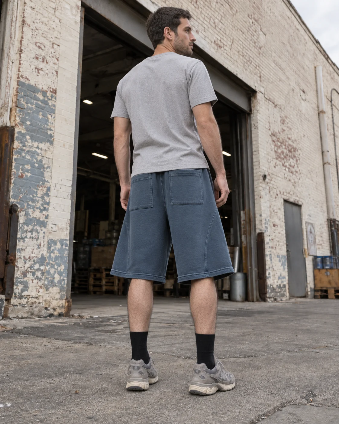 Distinct back design on the same model — Heavyweight Sweat Shorts in faded petrol / cream, AI-generated design concept