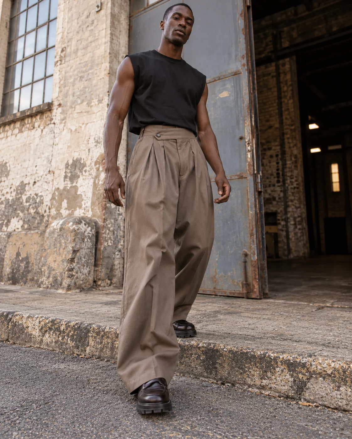 Full-body streetwear styling — Pleated Wide-Leg Trousers in warm taupe / tonal, AI-generated design concept