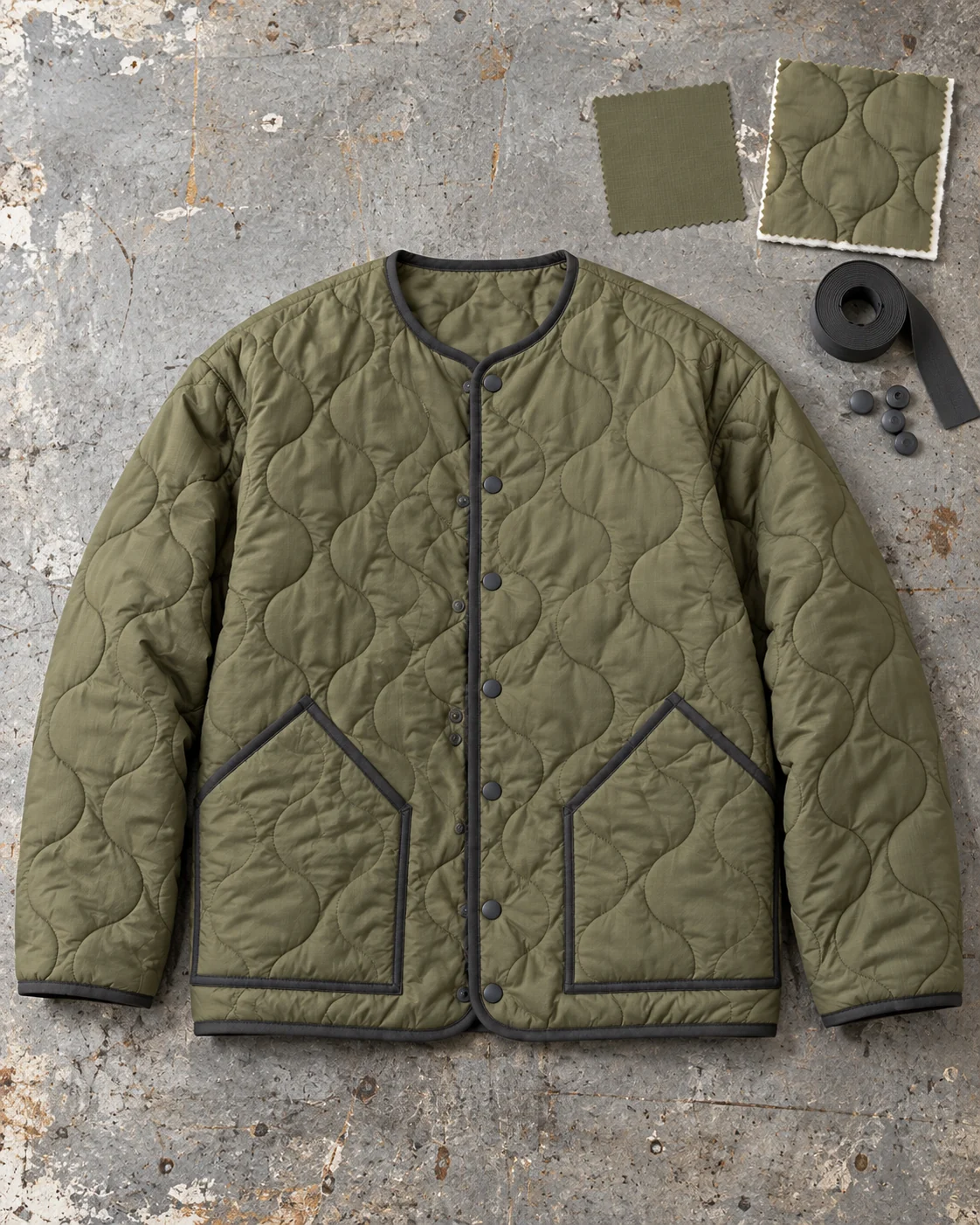 Garment development concept with materials and trims — Quilted Liner Jacket in dusty moss / charcoal, AI-generated design concept