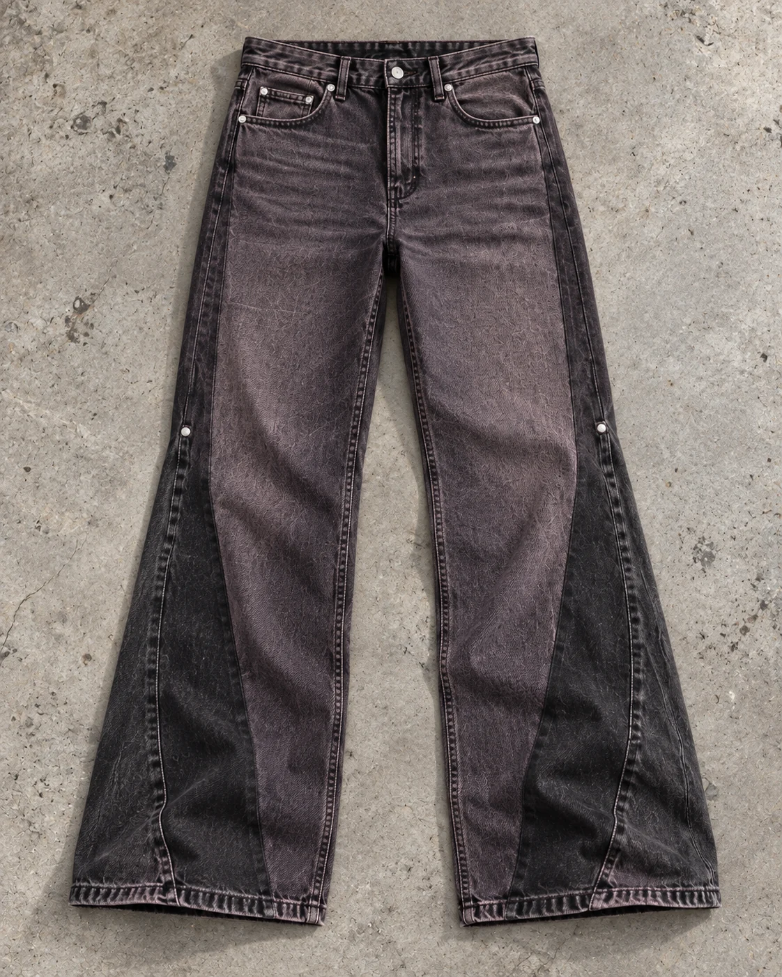 Full garment flat-lay showing the cut — Relaxed Flared Jeans in faded plum black / charcoal, AI-generated design concept