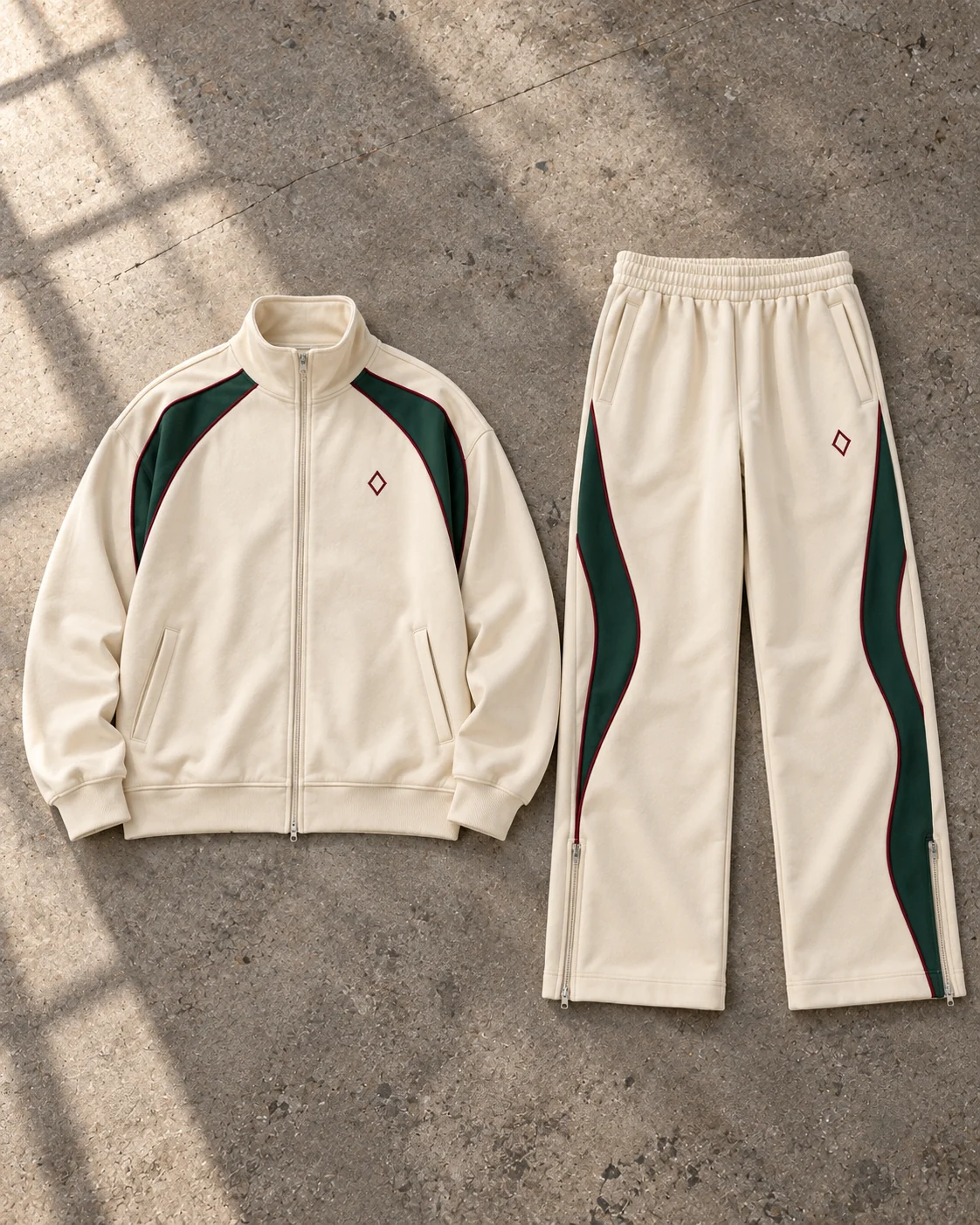 Complete top and bottom flat-lay showing their proportions — Retro Piped Track Set in ecru / forest / oxblood, AI-generated design concept