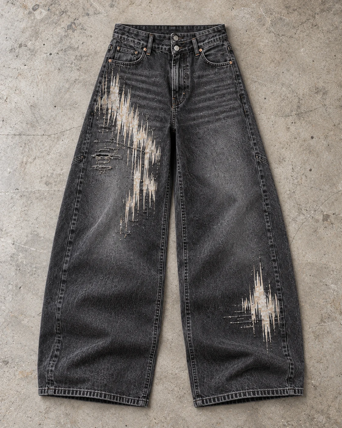 Full garment flat-lay showing the cut — Vintage-Wash Graphic Jeans in washed charcoal / bone, AI-generated design concept