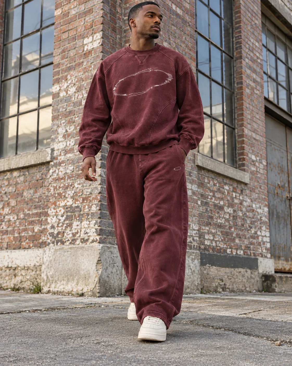 Full-body streetwear styling of the matching set — Vintage-Wash Sweat Set in faded oxblood / chalk, AI-generated design concept
